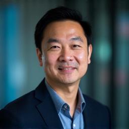 Professional headshot of Michael Chen.